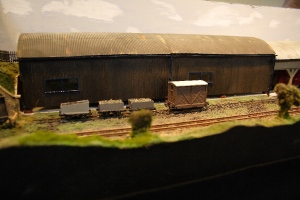 The carriage shed has received windows, and the brown plastic painted with a 